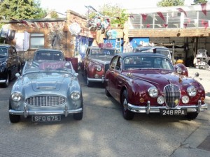 Two Jaguar cars