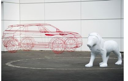 Landrover - Available To Lease Image is a Landrover in artform together with a sculpture of a lion