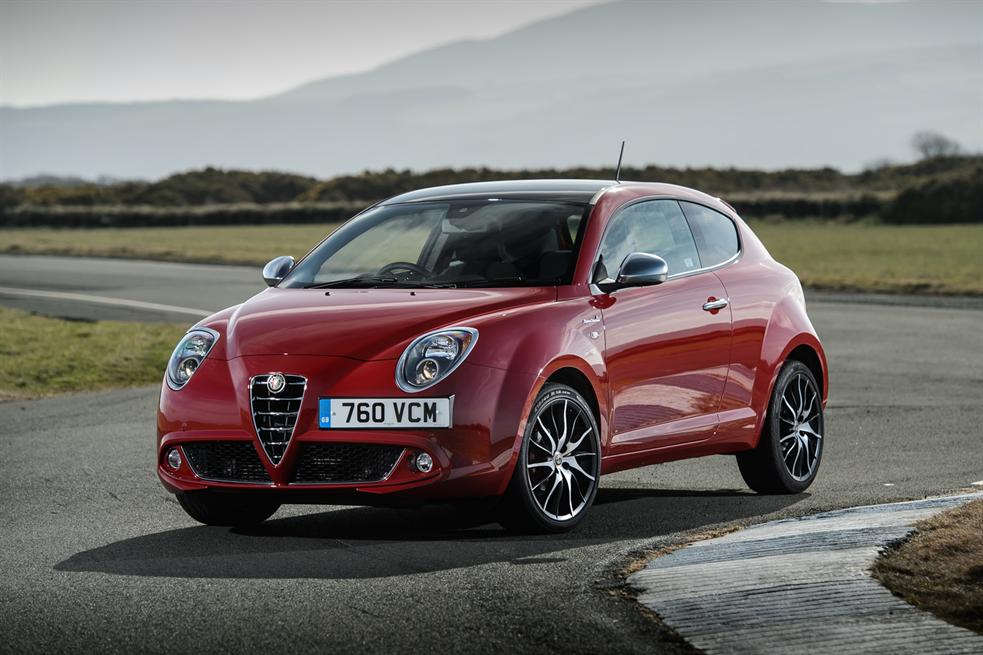 Alfa romeo Mito in red driving on a race track