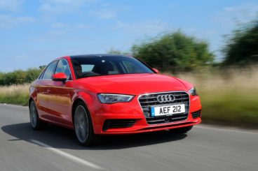 Audi A3 Saloon in red driving