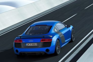 Audi R8 Coupe back view driving on snowy road