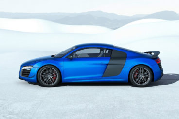 Audi R8 Coupe side view with snow background