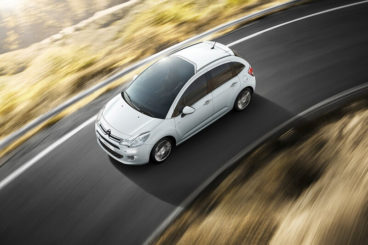 Citroen C3 Hatchback top view driving round bend