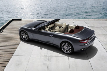 Maserati Gran Cabrio top view roof down parked by ocean