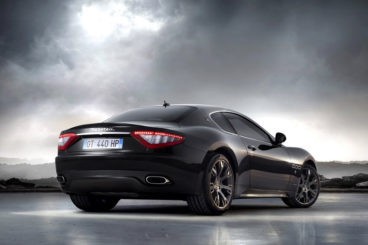 Maserati Granturismo back view cloudy sky