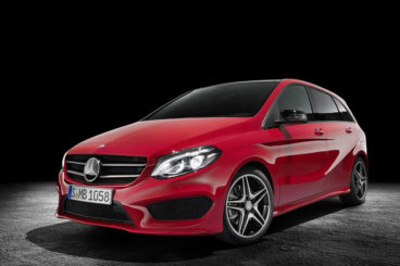 Mercedes B Class front view with red paint and black background