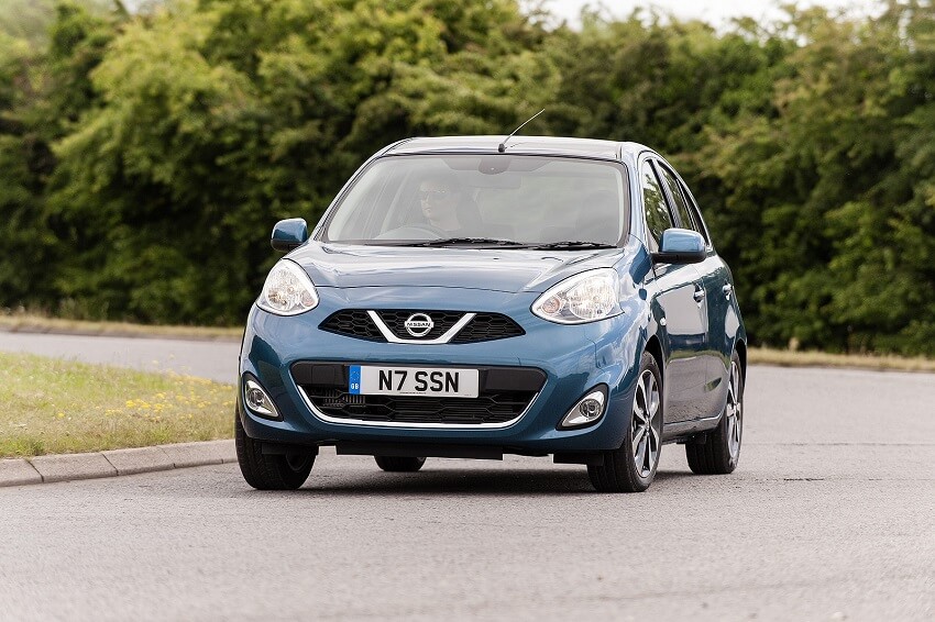 Nissan Micra front view driving on road