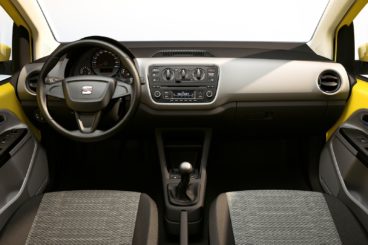 The yellow and grey interior of the SEAT mii hatchback