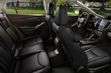 the black leather interior of the Subaru Impreza hatchback