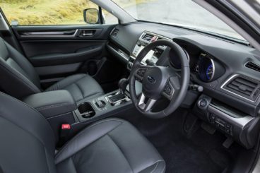 the black leather interior of the subaru outback estate