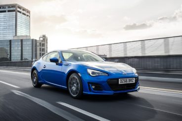 Blue Subaru BRZ Driving