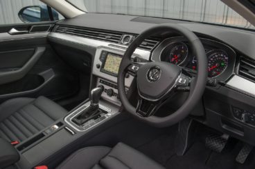 the black leather interior of the Volkswagen Passat Saloon