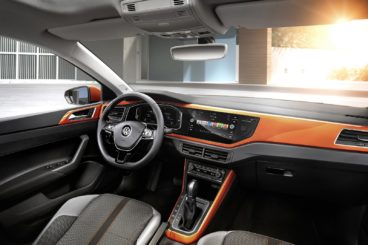 The black and coloured interior of the Volkswagen polo hatchback