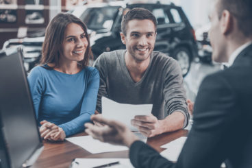 Couple completing paperwork