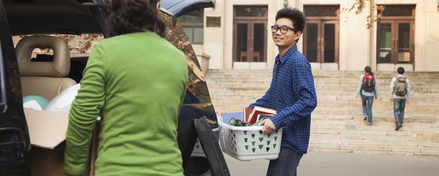 guarantee car finance - image of a person taking a basket from their car