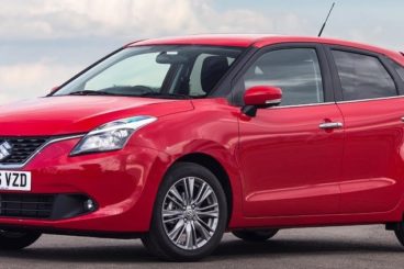 Red Suzuki Baleno Hatchback