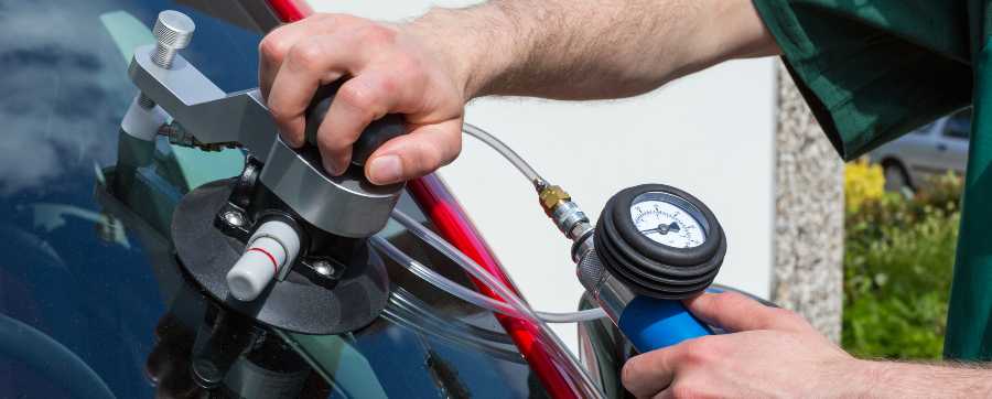 Windscreen damage being repaired