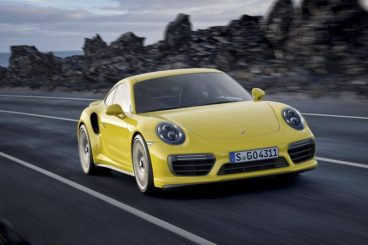 Porsche 911 Coupe in yellow driving