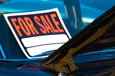 For sale poster on window