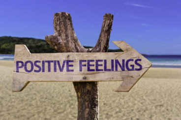 sign with 'positive feelings' written on it