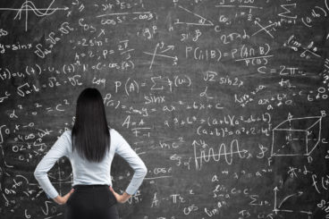 Women Looking at chalk board