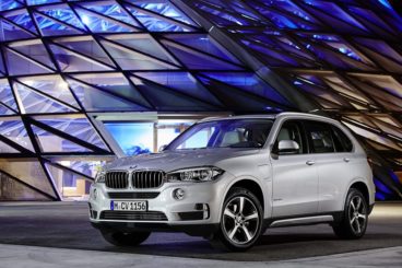 BMW X5 Estate parked infront of building
