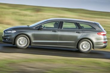 Ford Mondeo Vignale Estate side view driving on road