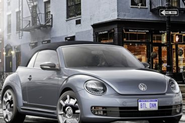 Volkswagen Beetle Cabriolet parked on street corner