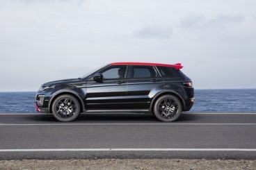 Side view of the black Range Rover Evoque with a red roof