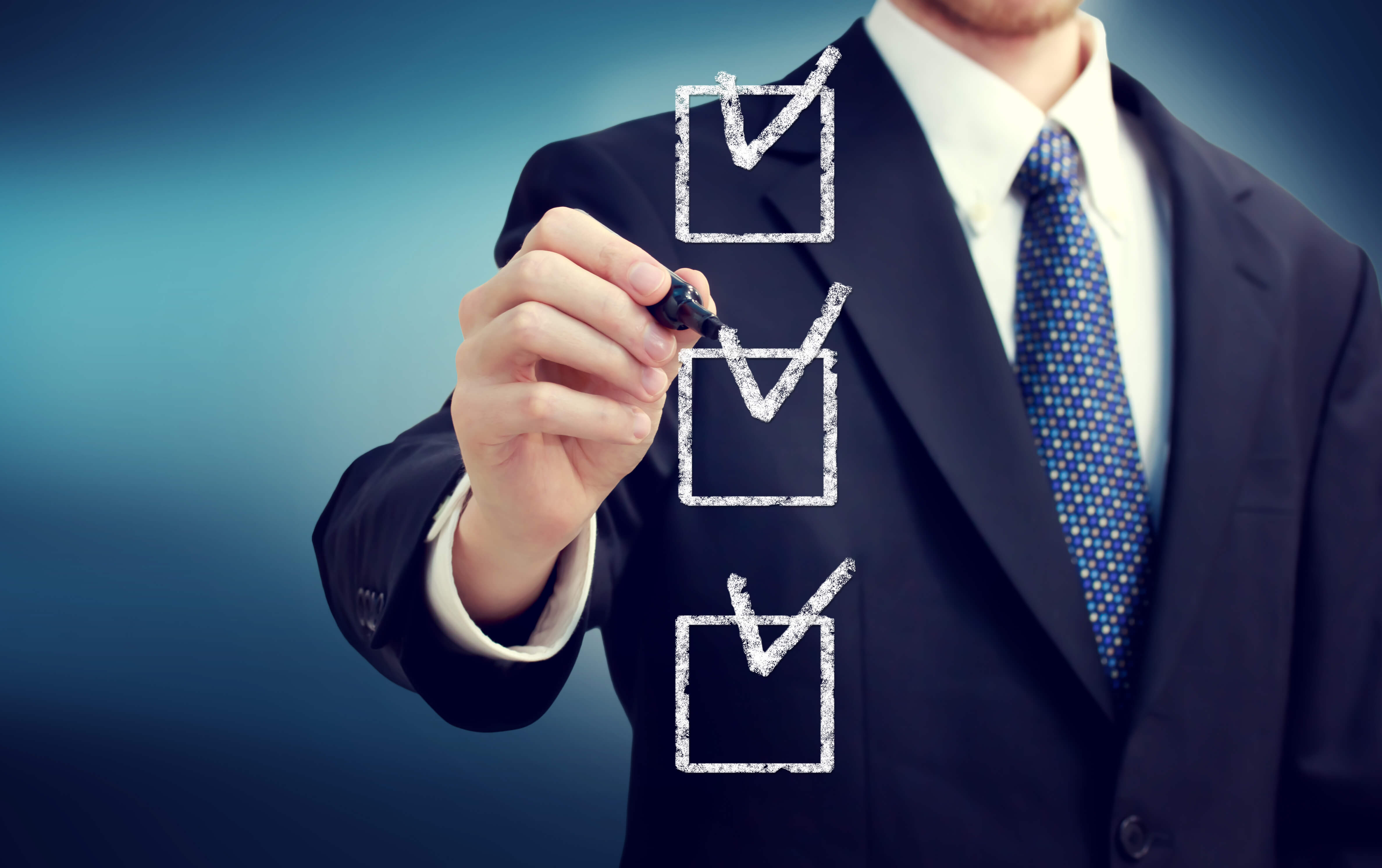 man ticking off checklist