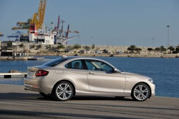 BMW 2 Series Coupe silver parked on dock