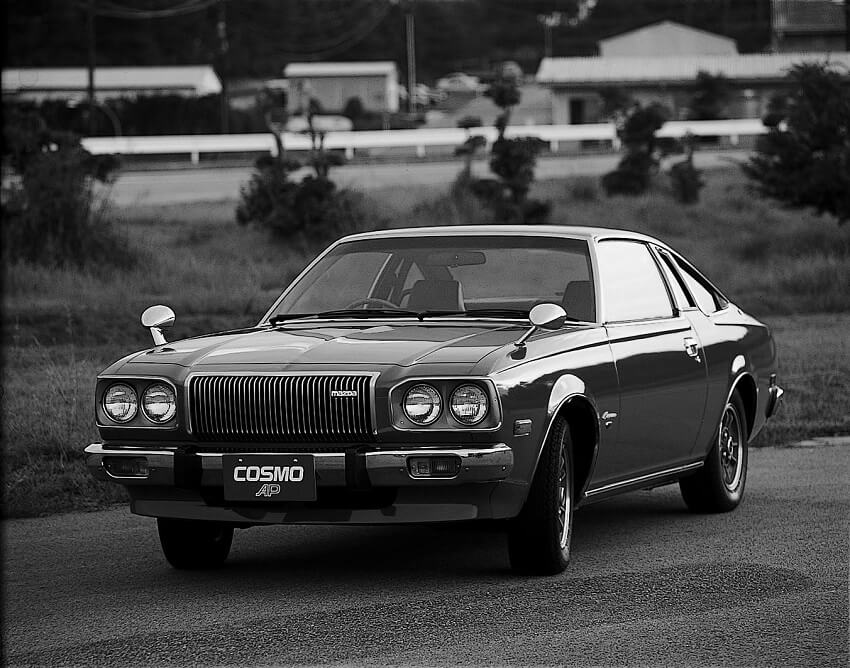 Mazda Cosmo vintage driving in black and white photograph