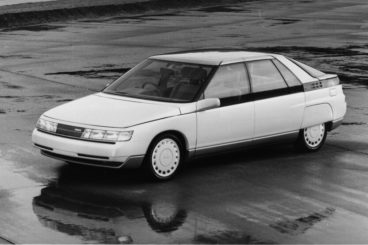 Mazda MX2 in white parked on wet floor