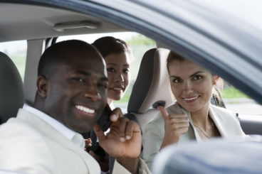3 business people in car - exempt from company car tax