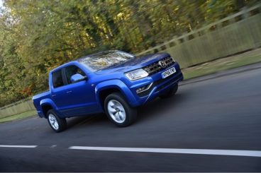 Blue Volkswagen Amarok metallic driving