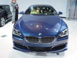 Blue metallic BMW alpina coupe parked in showroom