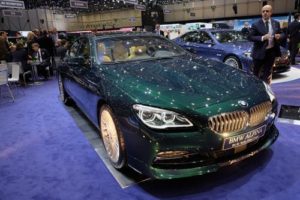 BMW Alpina Estate in green metallic parked in showroom