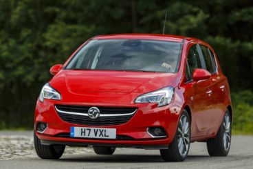 Vauxhall Corsa in red driving - best car for new drivers