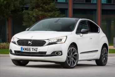 White DS4 stationary on the road