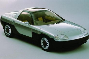 Old mazda car with white/ grey background