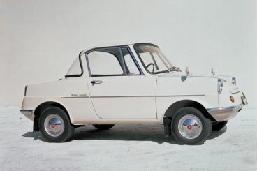 Old fashioned white mazda car