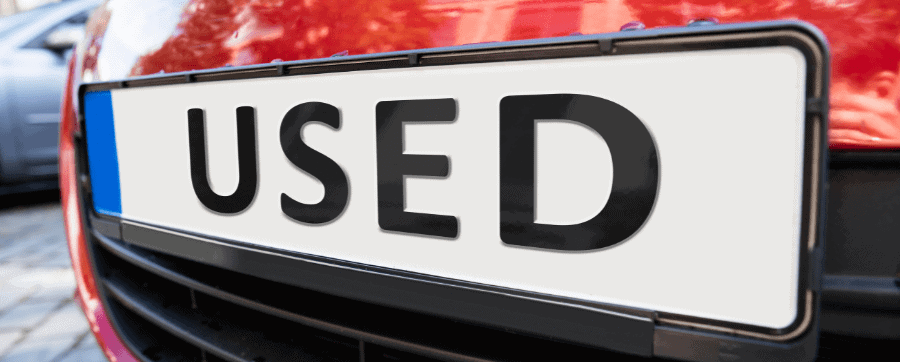 Close-up of a car numberplate reading 