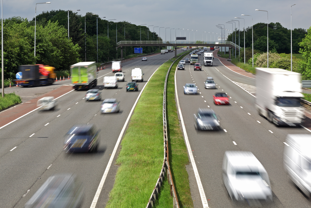 picture of a motorway in the daytime with cars driving quickly