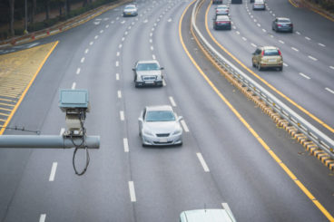 arial view of a motorway with a speed camera