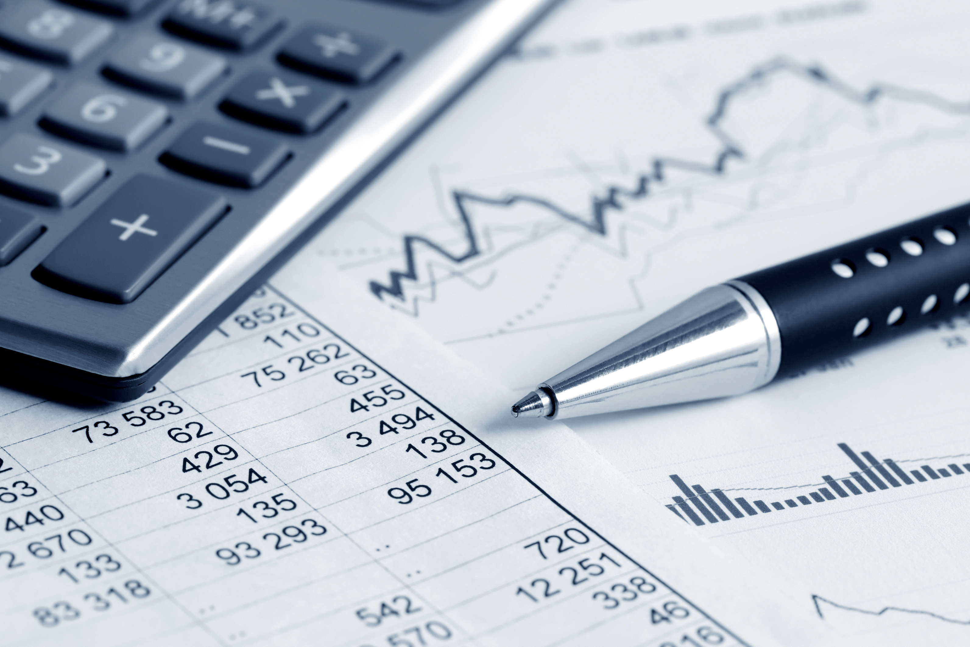 Working out budgets, Pen, figures and calculator