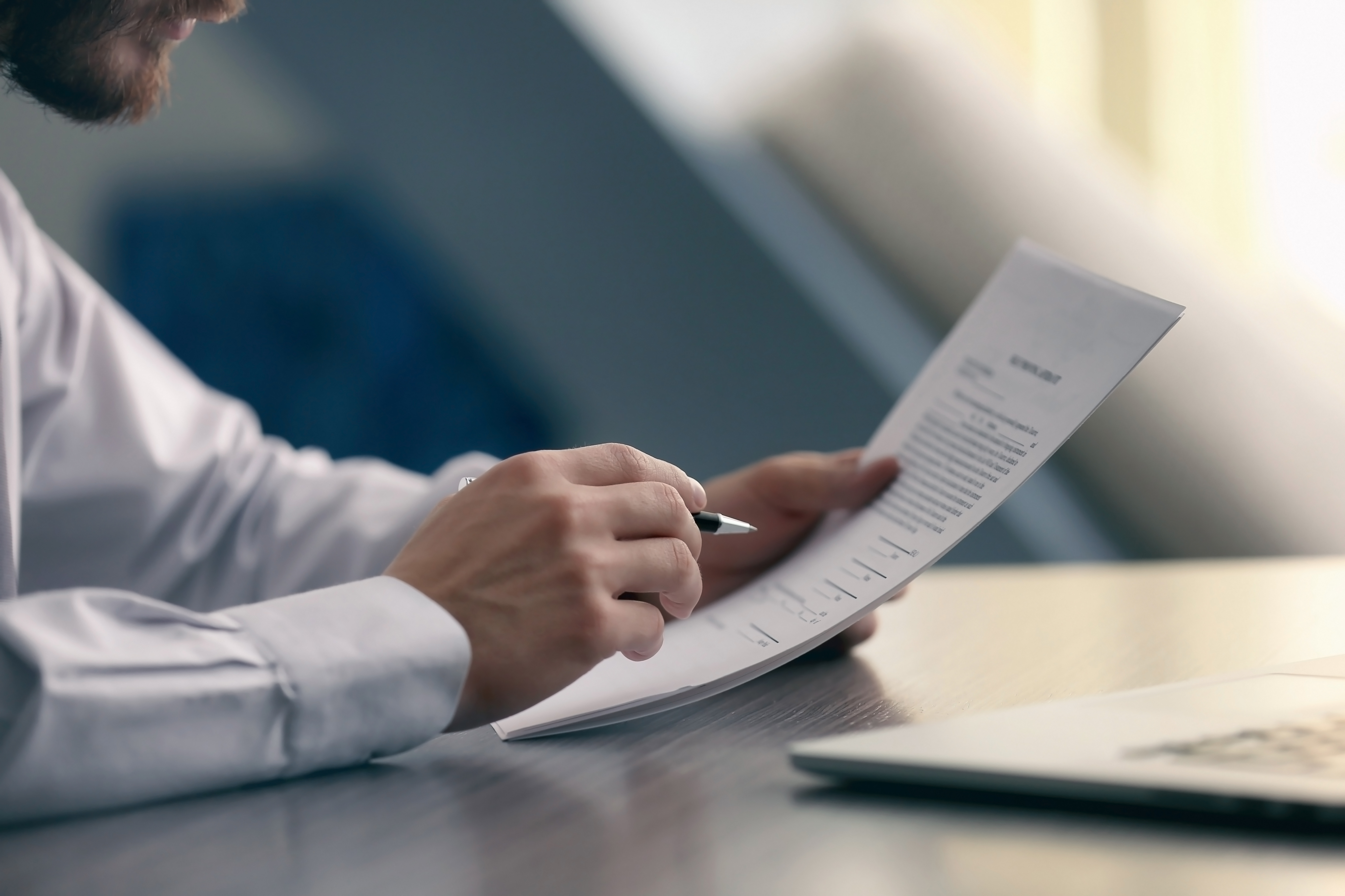 Man Looking at Documents - What Will Happen During My Call With OSV?