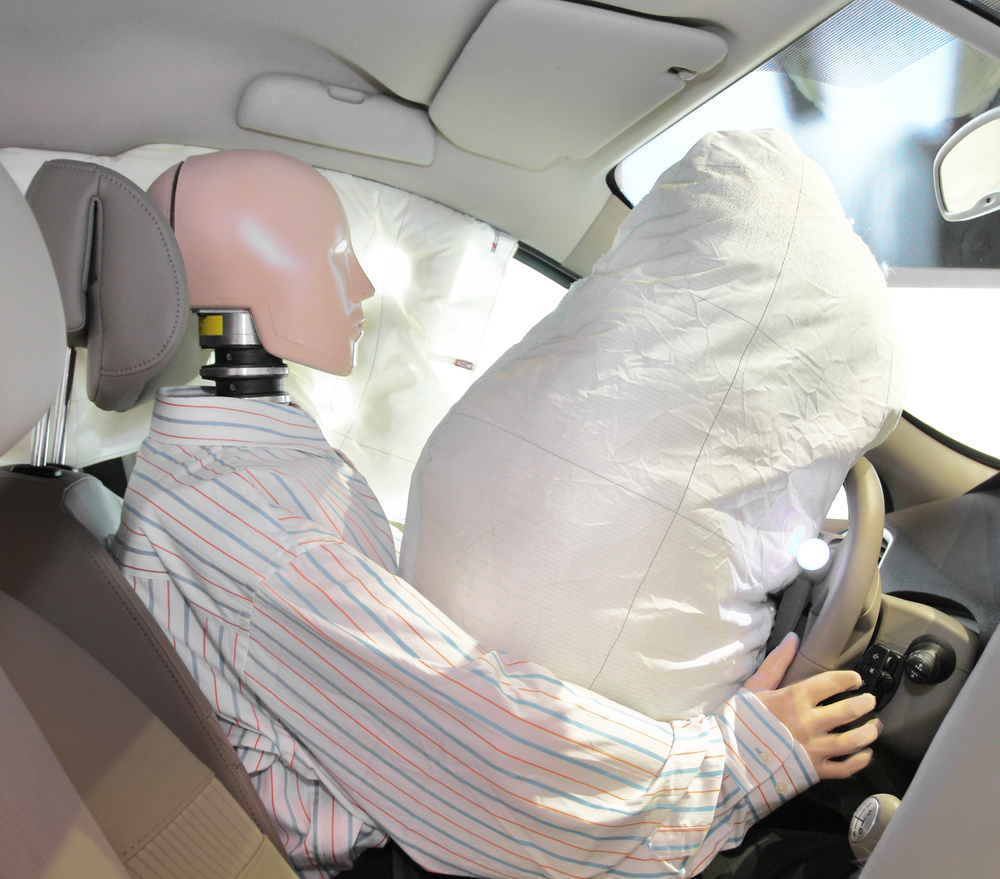 car crash dummy with an airbag