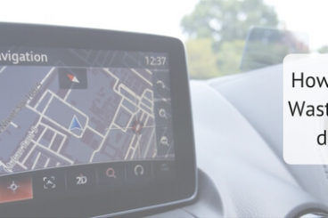 edited picture of a sat nav on car dashboard with the title how useful are sat navs? waste of time or essential driving companion?