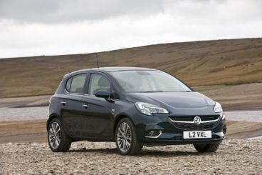 Grey Vauxhall Corsa on beach setting
