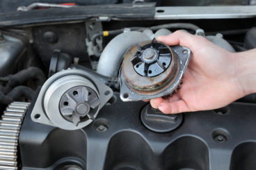 mechanic changing water pump - common faults